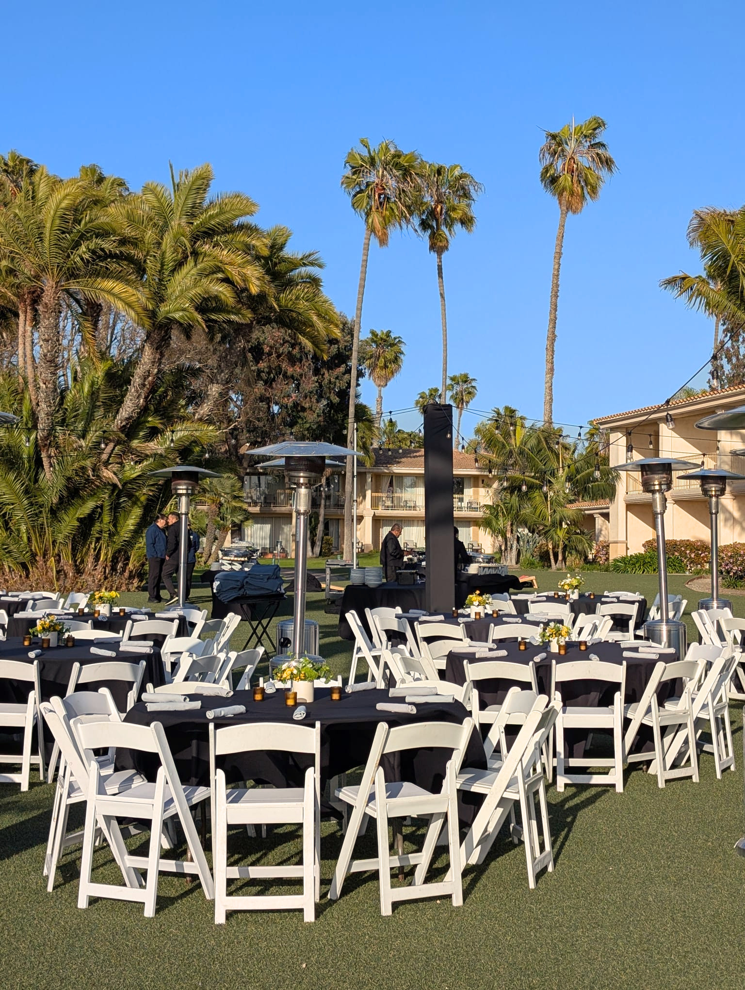 Picture of tables set for outdoor dinner at international Leadership Summit in San Diego